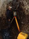Surveying with total station in bone passage © West Coast Archaeological Services