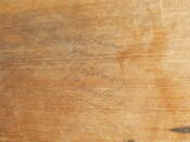 Joiner's mark and date on pew.JPG