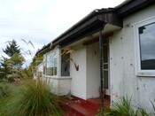 Photo 11 - West side of building.JPG