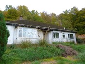 Photo 12 - West side of building.JPG