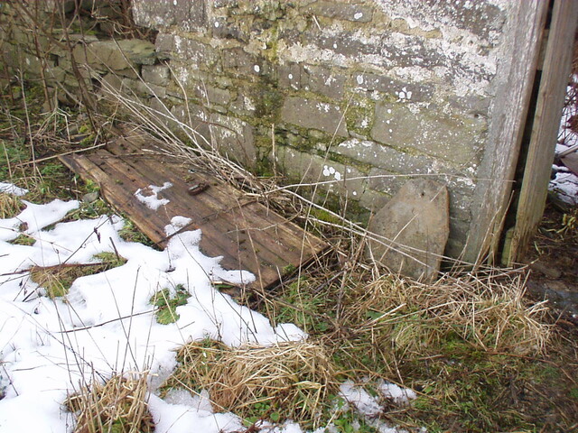 08. Broken off right hand side of front door, lying on groun.JPG