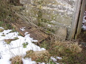 08. Broken off right hand side of front door, lying on groun.JPG