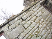 09. Top of wall between front door and right hand side windo.JPG