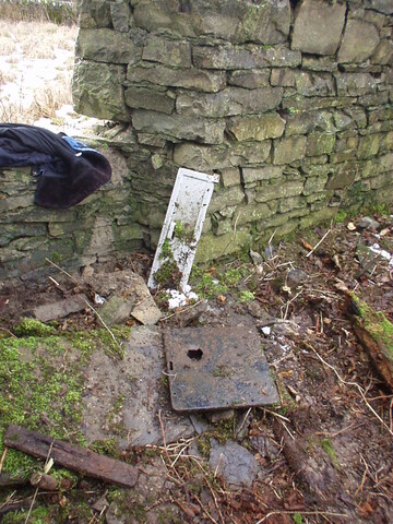 24. Pieces of old cooker found in front of right hand side f.JPG