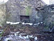30. Right hand side fireplace from centre of building.JPG