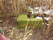 40. Large piece of masonary at rear of left hand side of bui.JPG