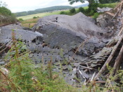 EHG5196_09. view from north of steading looking over collpased roof.JPG
